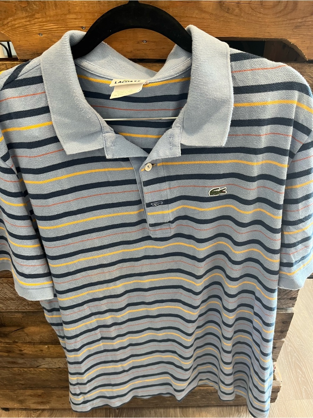 Vintage Lacoste Men’s Light Blue Striped Polo with Navy, Yellow & Red Accents